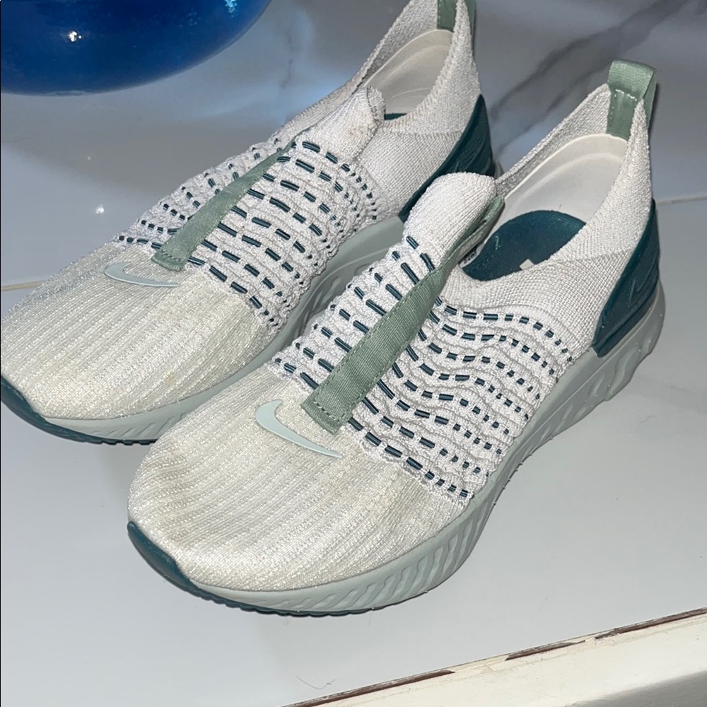 Nike White and Green Sneakers with Sleek Design